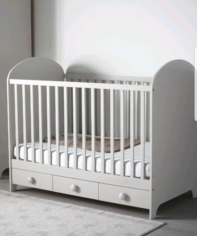 light grey cot bed